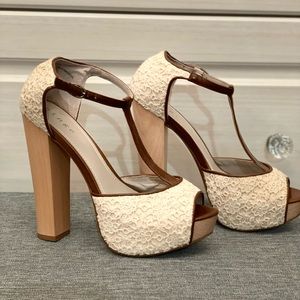 Hinge platform bottom, peep toe, floral heels. Size 6 1/2.